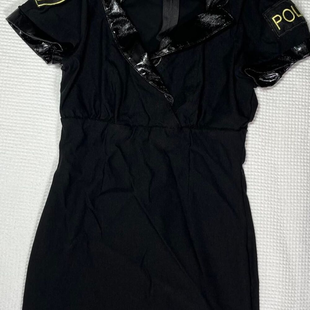 Spirit Halloween “Cutie on Duty” woman’s cop uniform  Size: Medium/Large